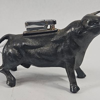 Sale Photo Thumbnail #34: Vtg Cast Metal Bull Table Lighter