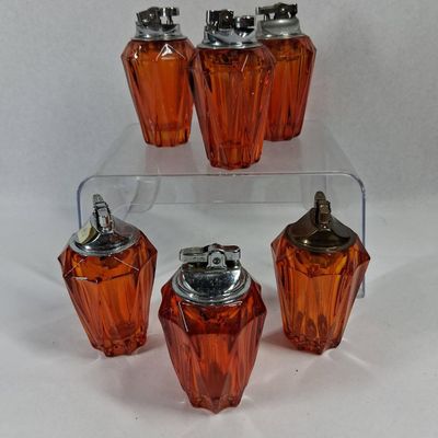 Sale Photo Thumbnail #173: Vtg Amber Faceted Glass Table Lighters
