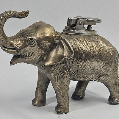 Sale Photo Thumbnail #28: Vtg Cast Metal Elephant Table Lighter