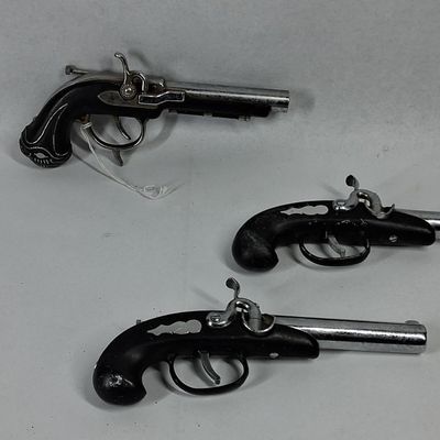 Sale Photo Thumbnail #147: Trio Japanese Replica Pistol Lighters