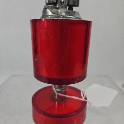 Sale Photo Thumbnail #160: MCM Red Acrylic & Chrome Table Lighter