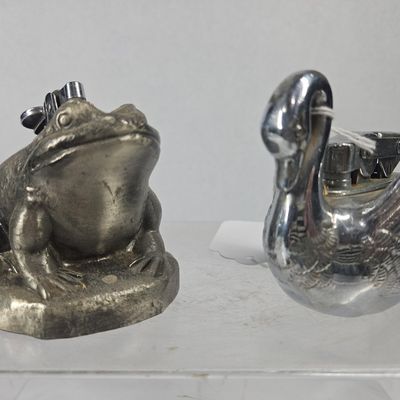 Sale Photo Thumbnail #159: Pair Metal Frog & Swan Table Lighters
