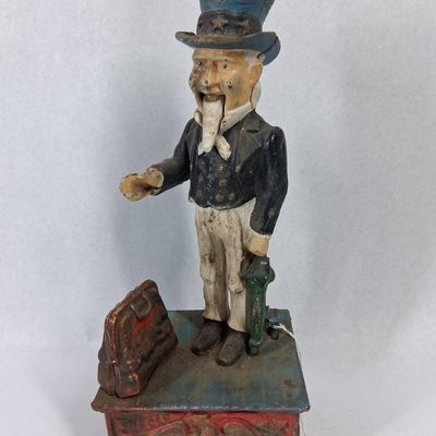 Sale Photo Thumbnail #67: Cast Iron Uncle Sam Mechanical Bank