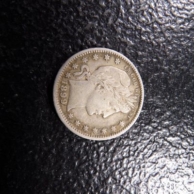1899 RARE DATE BARBER SILVER QUARTER