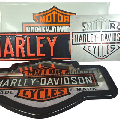 Four Harley-Davidson Branded Decorative Metal Signs and Bar and Shield Mirror