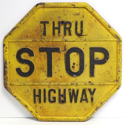 Sale Photo Thumbnail #70: Cast iron STOP Thru Highway sign