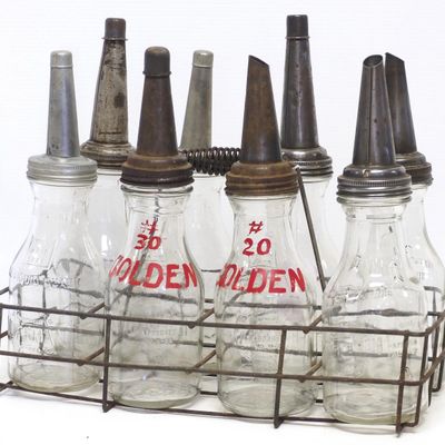 Sale Photo Thumbnail #376: Wire oil bottle carrier and Huffman oil bottles