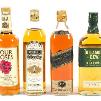 Sale Photo Thumbnail #33: 4 Bottles of Whiskey Incl. Johnnie Walker Black Label