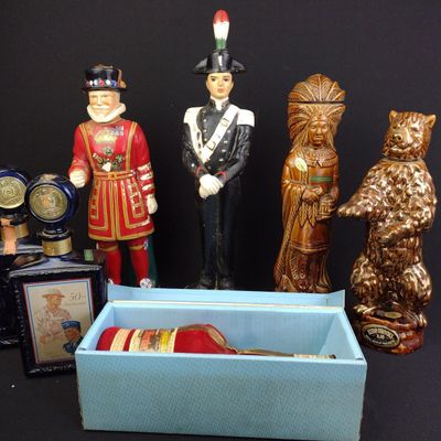 Sale Photo Thumbnail #523: 7 Whiskey Decanters Incl. Beefeater & Ezra Brooks
