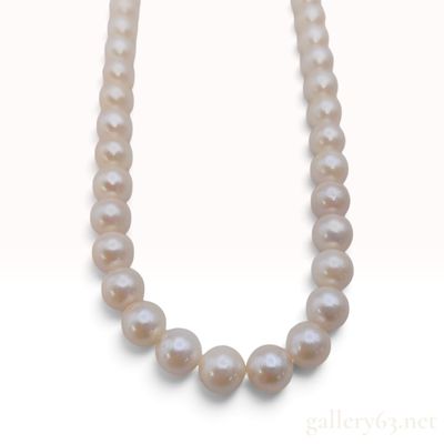 Sale Photo Thumbnail #597: Sterling Silver and Graduated Cultured Pearl Floral Clasp Necklace