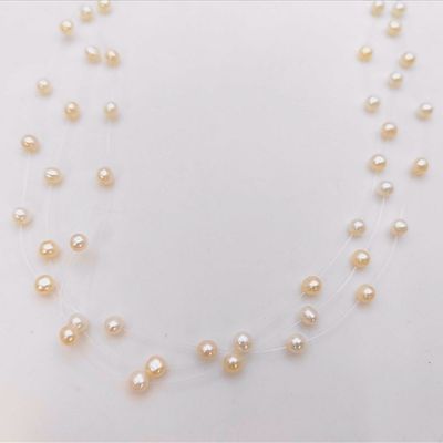 Sale Photo Thumbnail #407: 18 Karat Yellow Gold and Cultured Pearl Triple Strand Illusion Necklace