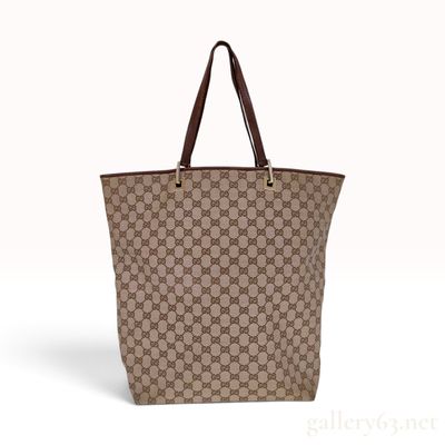 Sale Photo Thumbnail #181: A Vintage Gucci GG Monogram Canvas and Brown Leather Tote Bag