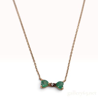 Sale Photo Thumbnail #224: Canal 4 degrees C 10K Yellow Gold Emerald and Natural Diamond Bow Necklace