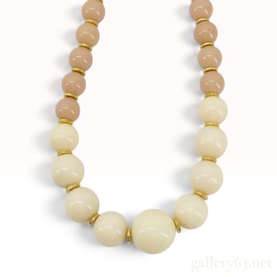 Sale Photo Thumbnail #350: Vintage Yves Saint Laurent Graduated Cream and Tan Resin Bead Necklace