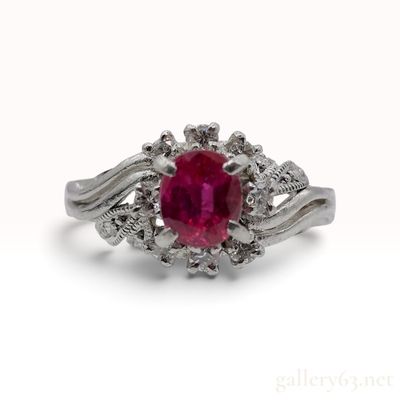 Sale Photo Thumbnail #145: A Vintage Platinum 0.62ct Ruby and 0.21ctw Natural Diamond Cocktail Ring