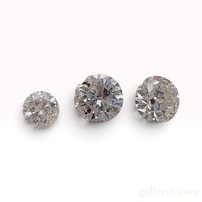 Sale Photo Thumbnail #609: A Trio of Round Brilliant Cut Salt and Pepper Natural Diamonds