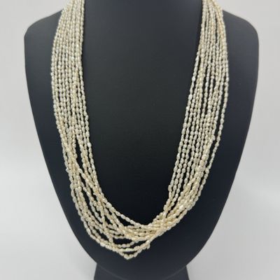 Sale Photo Thumbnail #42: A Vintage Assortment of Four Multi-Strand Freshwater Rice Pearl Necklaces