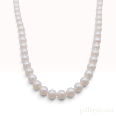 Sale Photo Thumbnail #607: Graduated White Cultured Pearl Necklace with Silver Floral Clasp