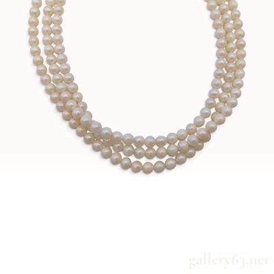 Sale Photo Thumbnail #383: A Vintage Silver and Cream Cultured Pearl Triple Strand Necklace 16 Inch