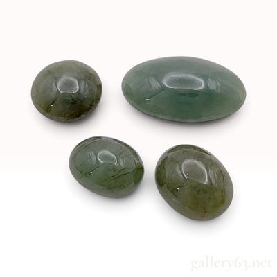 Sale Photo Thumbnail #627: Four Green Gemstone Cabochons Appearing To Be Nephrite Jade