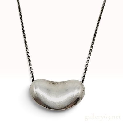 Sale Photo Thumbnail #140: Vintage Tiffany & Co. Elsa Peretti Bean Sterling Silver Pendant Necklace