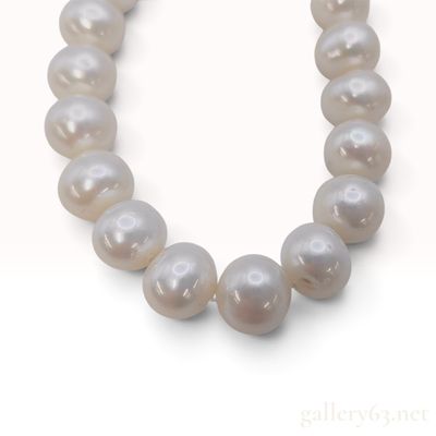 Sale Photo Thumbnail #187: A Single Strand Cultured Pearl Necklace with Yellow Gold Toned Clasp