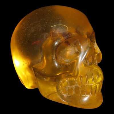 Sale Photo Thumbnail #326: 1 3/4" Amber Resin Skull with Scorpion in Head