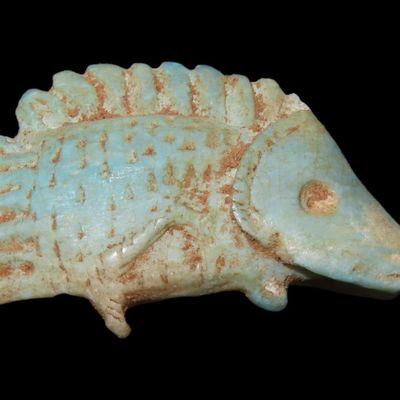 Sale Photo Thumbnail #295: 1 1/2" Egyptian Fish (Tilapia) Amulet, Representing Rebirth, Fertility, and Divine Protection
