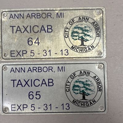 Pair Ann Arbor Michigan Taxicab Exp 5-31-13 Plates