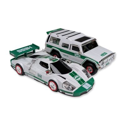 Two Hess Toy Sport Utility Vehicle with Motorcycles and Race Car with Racer Sets