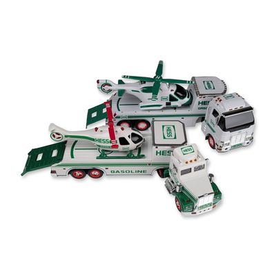 Two Hess Toy Trucks and Helicopter Sets