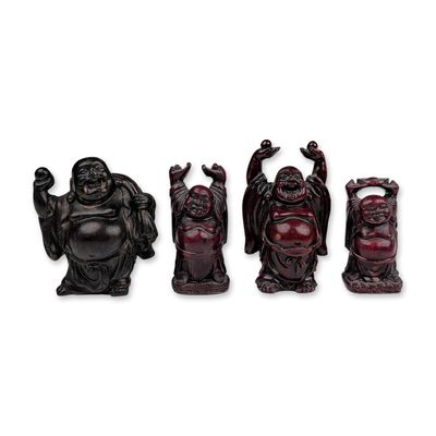 Group of Four Miniature Resin Laughing Buddha Figurines