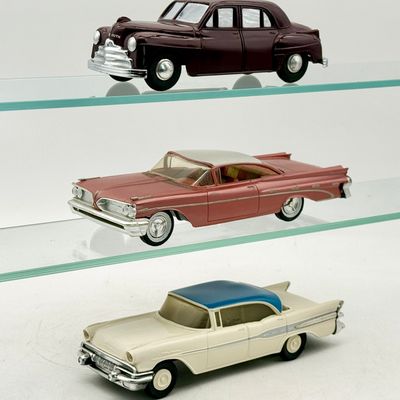 3 Vintage AMT promos including 1940s Plymouth and 1950s Pontiacs