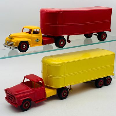 2 PMC International Roadliner Tractor-Trailers