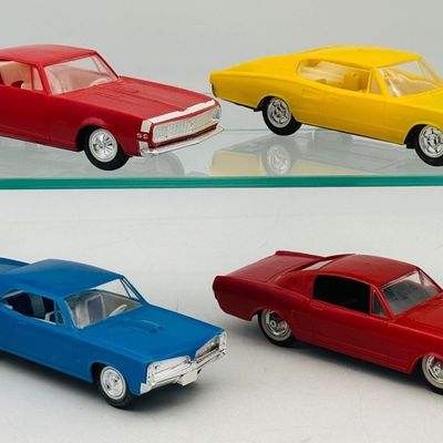 4 Japanese Cragstan Plastic Friction Muscle Cars