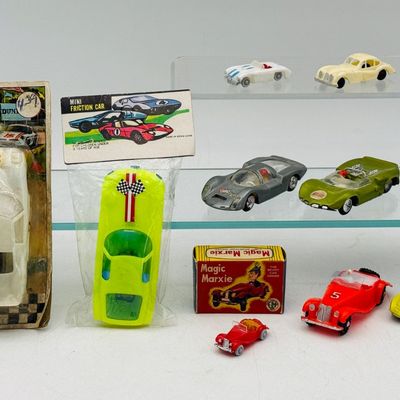 12 small HK Vintage Plastic Friction Powered Toy Cars