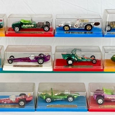 13 ZEE HK plastic toy cars in display boxes