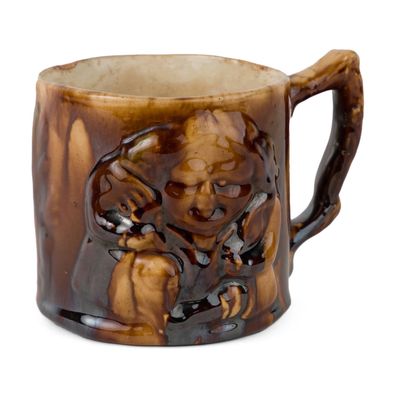 New Jersey Relief-Molded Rockingham-Glazed Toby Mug with Frog, Attributed to Daniel Regan