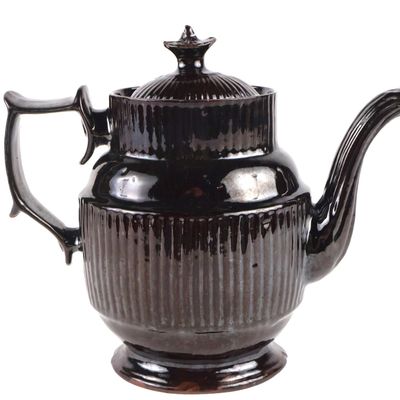 American Black-Glazed Relief-Molded Ribbed Redware Oval Coffee Pot (Probably Philadelphia, PA)