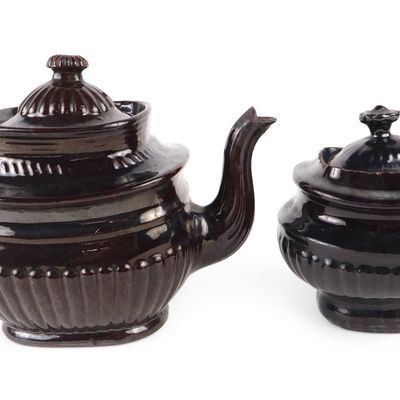 American Black-Glazed Relief-Molded Redware Teapot and Sugar Bowl (Probably Philadelphia, PA)