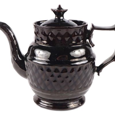 American Black-Glazed Relief-Molded Diamond Redware Oval Coffee Pot (Probably Philadelphia, PA)