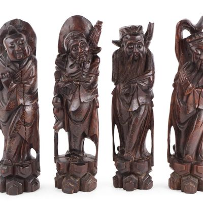 Four Carved Hardwood Sculptures of Taoist Immortals