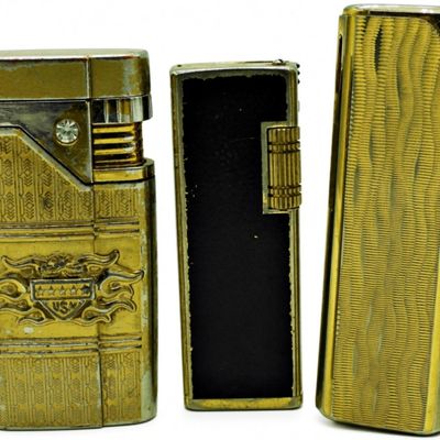 Three Vintage Gold-Tone Butane Lighters