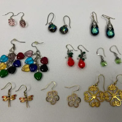Fish Hook Earring In Gold Tone And Silver Tone
