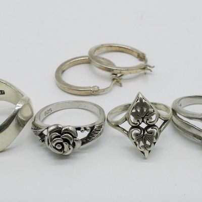Four Sterling Rings and One Pair of Hoops