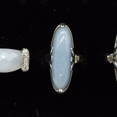 Three Sterling Rings with Blue Gemstones