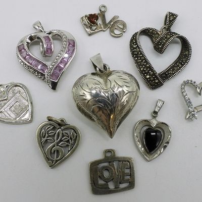 Nine Sterling Heart Pendants