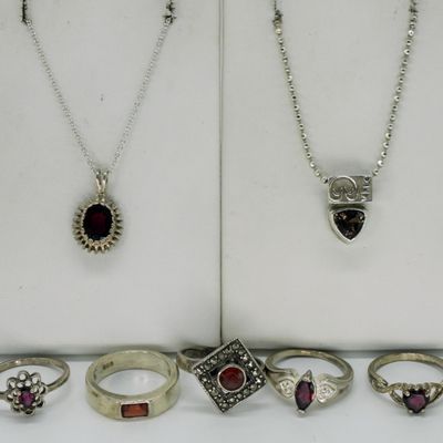 Seven Sterling Garnet Rings & Necklaces