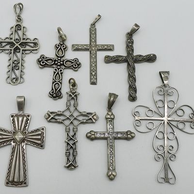 Eight Sterling Cross Pendants
