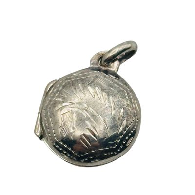 Sale Photo Thumbnail #476: Sterling Etched Locket